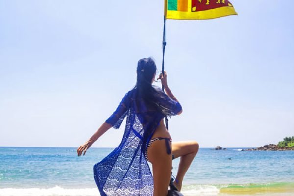 rear-view-woman-in-blue-swimwear-swing-on-bungee-w-2023-11-27-05-17-38-utc
